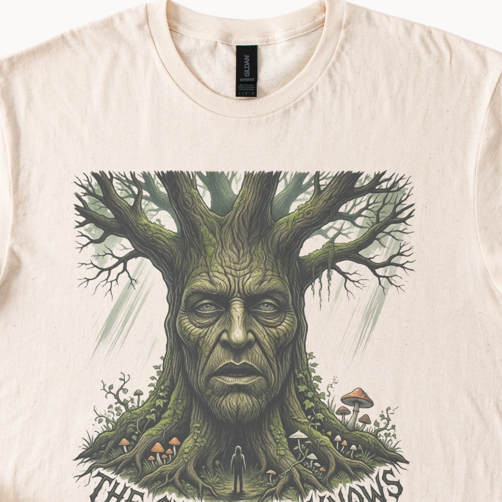 The Grimwood Knows Ancient Face Tree Looms Over Tiny Figure Tee